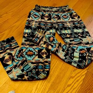 Thin material stretch leggings. Tribal pattern. Size small.